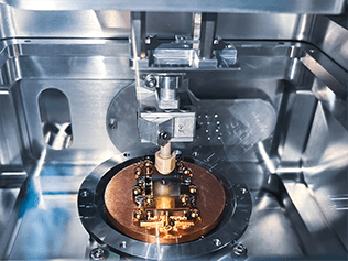 Ultra-low-temperature liquid helium tribometer inside setup for friction, wear, hardness, scratch resistance measurements under vacuum at cryogenic temperatures.